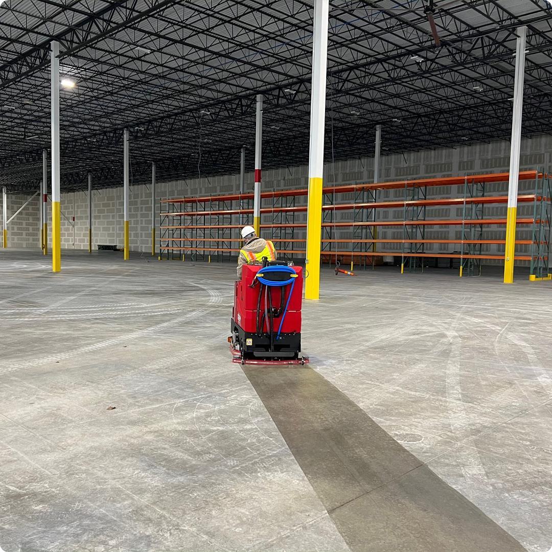 FactoryCat Ride On Floor Scrubbers GTR warehouse concrete - https://assets.factorycat.com/demoImages/2024/july/factorycat-ride on floor scrubbers-gtr-warehouse-concrete-101.jpg - 1080 - 1080 - 101 GTR Ride On Floor Scrubbers Kansas Logistics
